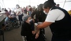 An elderly woman gets her Sinovac Biotech COVID-19 vaccine at the Americas sports center in Ecatepec, a borough on the outskirts of Mexico City. (AP) An elderly woman gets her Sinovac Biotech COVID-19 vaccine at the Americas sports center in Ecatepec, a borough on the outskirts of Mexico City. (AP)