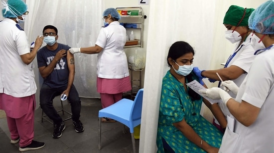 Frontline workers get shots of Covid19 India vaccine Covishield at Nair Hospital, in Mumbai on Monday. (ANI) Frontline workers get shots of Covid19 India vaccine Covishield at Nair Hospital, in Mumbai on Monday. (ANI)