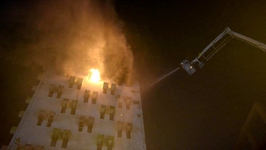 Firefighters try to put out a fire that broke out in a multistory building in Kolkata on Monday.(ANI Photo) Firefighters try to put out a fire that broke out in a multistory building in Kolkata on Monday.(ANI Photo)