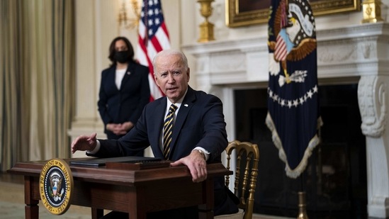 U.S. President Joe Biden in the State Dining Room of the White House in Washington, DC, US, on Wednesday, Feb. 24, 2021. Biden revoked a proclamation from his predecessor that blocked many green card applicants from entering US. (Bloomberg) U.S. President Joe Biden in the State Dining Room of the White House in Washington, DC, US, on Wednesday, Feb. 24, 2021. Biden revoked a proclamation from his predecessor that blocked many green card applicants from entering US. (Bloomberg)
