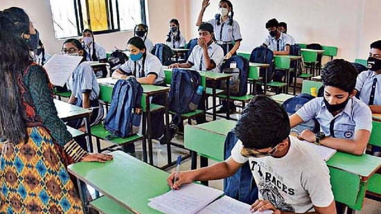 Students in a classroom in a school in Kasheli village, Bhiwandi, which reopened after a year in February. HT Photo