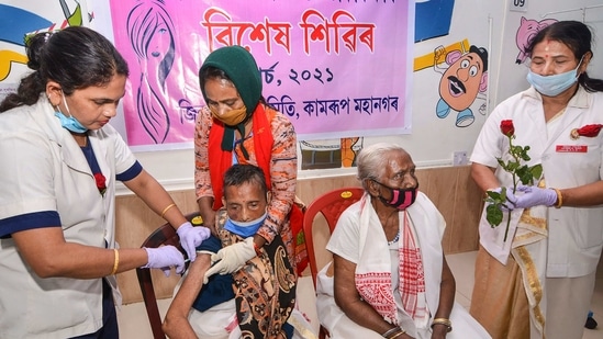 Elderly citizens receive Covid vaccine shots in Guwahati on Monday.(PTI Photo) Elderly citizens receive Covid vaccine shots in Guwahati on Monday.(PTI Photo)