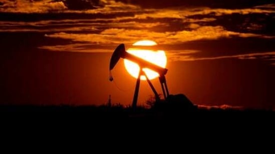 The sun sets behind an idle pump jack near Karnes City, USA. (AP) The sun sets behind an idle pump jack near Karnes City, USA. (AP)