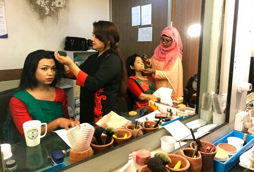 Bangladesh's first transgender news anchor Tashnuva Anan Shishir, left, gets ready to read news bulletin , in Dhaka, Bangladesh, Tuesday, March 9, 2021. A Bangladeshi satellite television station has signed up the South Asian county's first transgender news anchor with a hope to remove the deeply-rooted social stigma they face. (AP) Bangladesh's first transgender news anchor Tashnuva Anan Shishir, left, gets ready to read news bulletin , in Dhaka, Bangladesh, Tuesday, March 9, 2021. A Bangladeshi satellite television station has signed up the South Asian county's first transgender news anchor with a hope to remove the deeply-rooted social stigma they face. (AP)