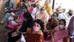 People wait for their turn to receive the dose of Covid-19 vaccine, in Patna on Tuesday.(ANI Photo) People wait for their turn to receive the dose of Covid-19 vaccine, in Patna on Tuesday.(ANI Photo)