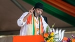 Mithun Chakrabarty gestures delivering his speech after joining the Bharatiya Janata Party ahead of West Bengal state elections in Kolkata.(AP Photo )