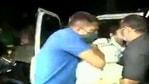 Mamata Banerjee being carried to the back seat of the car on Wednesday.
