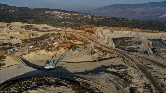 An aerial view of an open-pit coal mine and olive groves of Turgut village, near Yatagan, on February 25. Determined to save her land and village, Demirel has singlehandedly taken on the operators extending the mine to feed what is one of Turkey's largest power plants.(Umit Bektas / REUTERS)