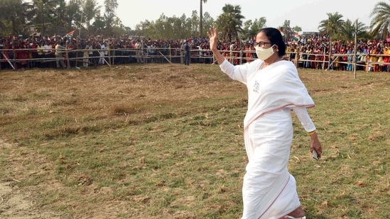 West Bengal Chief Minister Mamata Banerjee waves to his supporters as she arrives to address a public meeting ahead of assembly elections, in Nandigram on Tuesday. (ANI Photo) West Bengal Chief Minister Mamata Banerjee waves to his supporters as she arrives to address a public meeting ahead of assembly elections, in Nandigram on Tuesday. (ANI Photo)