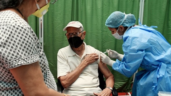 With the current timing of 8-12 hours, around 35,000-40,000 people are getting vaccinated by the BMC. (ANI Photo) With the current timing of 8-12 hours, around 35,000-40,000 people are getting vaccinated by the BMC. (ANI Photo)