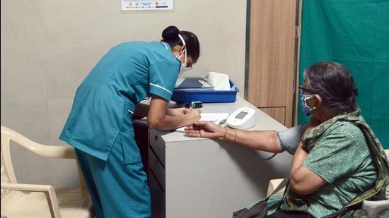 A senior citizen gets her blood pressure checked during the vaccination drive at Inlaks & Budhrani Hospital in Pune, on March 9, 2021. (HT PHOTO) A senior citizen gets her blood pressure checked during the vaccination drive at Inlaks & Budhrani Hospital in Pune, on March 9, 2021. (HT PHOTO)