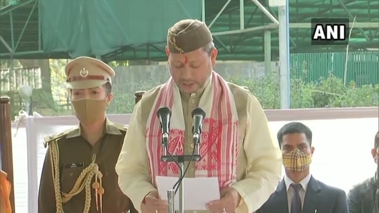 Tirath Singh Rawat taking oath as Uttarakhand CM.(ANI)