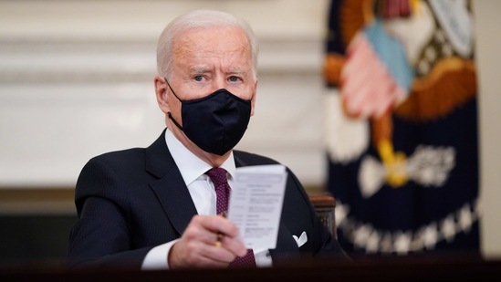 President Joe Biden participates in a roundtable discussion on a coronavirus relief package in the State Dining Room of the White House in Washington. (AP) President Joe Biden participates in a roundtable discussion on a coronavirus relief package in the State Dining Room of the White House in Washington. (AP)