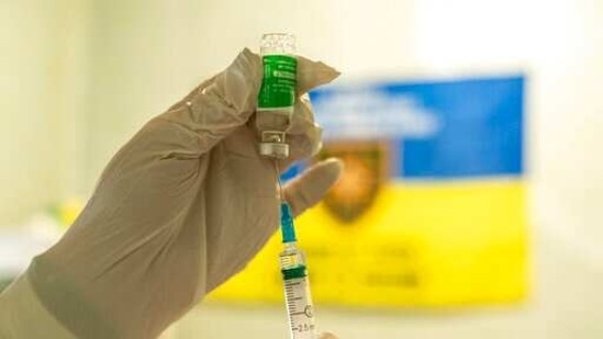 A medic prepares to administer a dose of an AstraZeneca COVID-19 vaccine marketed under the name CoviShield, to a Ukrainian serviceman at a military base near the front-line town of Krasnohorivka, eastern Ukraine, Friday, March 5, 2021.(AP Photo/Evgeniy Maloletka) A medic prepares to administer a dose of an AstraZeneca COVID-19 vaccine marketed under the name CoviShield, to a Ukrainian serviceman at a military base near the front-line town of Krasnohorivka, eastern Ukraine, Friday, March 5, 2021.(AP Photo/Evgeniy Maloletka)