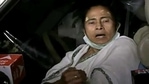 West Bengal CM Mamata Banerjee speaks to the media after being injured as she was pushed by a few people, in Nandigram on Wednesday. (ANI Photo) West Bengal CM Mamata Banerjee speaks to the media after being injured as she was pushed by a few people, in Nandigram on Wednesday. (ANI Photo)