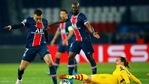 PSG's Kylian Mbappe, left, fights for the ball with Barcelona's Antoine Griezmann during the Champions League, (AP) PSG's Kylian Mbappe, left, fights for the ball with Barcelona's Antoine Griezmann during the Champions League, (AP)