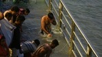 Hindu devotees take a holy dip in the waters of the River Ganges on the Shahi Snan on the occasion of Maha Shivratri during the ongoing Kumbh Mela festival in Haridwar. (AFP Photo ) Hindu devotees take a holy dip in the waters of the River Ganges on the Shahi Snan on the occasion of Maha Shivratri during the ongoing Kumbh Mela festival in Haridwar. (AFP Photo )