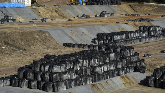 Bags of radioactive waste in Futaba, Fukushima Prefecture, Japan, on March 7, 2021. Laid waste by a nuclear disaster a decade ago, Japan’s Fukushima is still struggling to recover, even as the government tries to bring people and jobs back to former ghost towns by pouring in billions of dollars to decontaminate and rebuild.(Toru Hanai / Bloomberg)