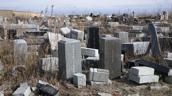 A cemetery damaged by the 2011 earthquake and tsunami in Namie, Fukushima Prefecture, Japan, on March 8, 2021.(Toru Hanai / Bloomberg)