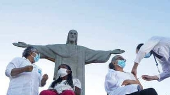 While Covid-19 deaths and infections are falling globally, that is not the case in Brazil (AP Photo/Bruna Prado, File).(AP) While Covid-19 deaths and infections are falling globally, that is not the case in Brazil (AP Photo/Bruna Prado, File).(AP)