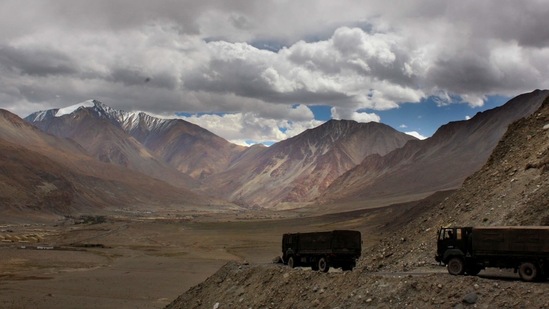 FILE- In this Sept. 14, 2017, file photo, Indian army trucks drive near Pangong Tso lake near the India China border in India's Ladakh area. The Indian army said Saturday, Jan. 9, 2020, that it has apprehended a Chinese soldier in the remote Ladakh region, where the two countries are locked in a monthslong military standoff along their disputed mountain border. An army statement said the Chinese soldier was taken into custody on Friday for transgressing into the Indian side in area South of Pangong Tso lake. (AP Photo/Manish Swarup)(AP)