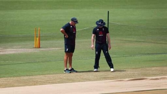 England head coach Chris Silverwood with captain Eoin Morgan inspect the pitch during a training session ahead of the first T20I in Ahmedabad(AP)