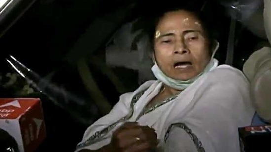 West Bengal CM Mamata Banerjee speaks to the media after being injured as she was pushed by a few people, in Nandigram on Wednesday. (ANI Photo) West Bengal CM Mamata Banerjee speaks to the media after being injured as she was pushed by a few people, in Nandigram on Wednesday. (ANI Photo)