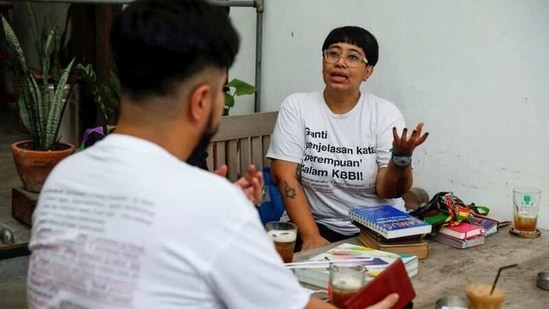 Indonesian artist Ika Vantianti talks with her colleague Yolando Zelkeos Siahaya at a cafe in Jakarta, Indonesia,(Reuters) Indonesian artist Ika Vantianti talks with her colleague Yolando Zelkeos Siahaya at a cafe in Jakarta, Indonesia,(Reuters)