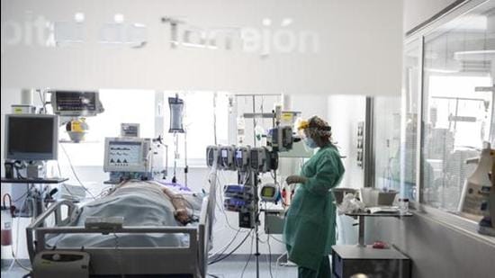 A healthcare worker in an ICU with a patient with Covid-19. (File photo) A healthcare worker in an ICU with a patient with Covid-19. (File photo)