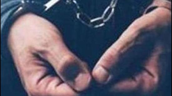 Arrested computer hacker and cyber criminal with handcuffs, close up of hands (Getty Images/iStockphoto) Arrested computer hacker and cyber criminal with handcuffs, close up of hands (Getty Images/iStockphoto)