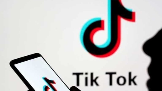 A person holds a smartphone with Tik Tok logo displayed in this picture illustration (REUTERS). A person holds a smartphone with Tik Tok logo displayed in this picture illustration (REUTERS).