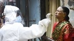 A health worker collects a swab sample from an elderly woman for the Covid-19 test.(Kunal Patil/PTI) A health worker collects a swab sample from an elderly woman for the Covid-19 test.(Kunal Patil/PTI)