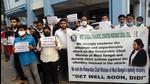 Medical students of SSKM Hospital and TMC legal cell hold a rally to pray for CM Mamata Banerjee's speedy recovery, in Kolkata on March 11. (ANI)