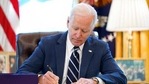 President Joe Biden signs the American Rescue Plan, a coronavirus relief package, in the Oval Office of the White House, Thursday, March 11, 2021, in Washington. (AP) President Joe Biden signs the American Rescue Plan, a coronavirus relief package, in the Oval Office of the White House, Thursday, March 11, 2021, in Washington. (AP)