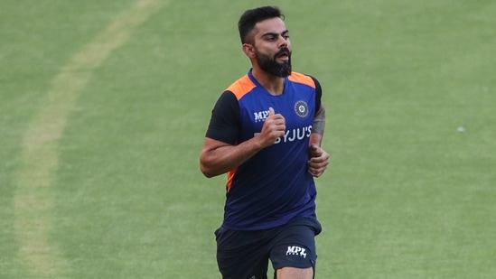 India's Virat Kohli warms up during a training session ahead of the first Twenty20 cricket match between India and England in Ahmedabad, (AP)