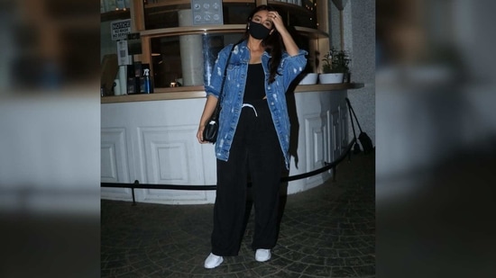 For her dinner, Ileana D'Cruz opted for the classic blue and black combo. She wore a black bodysuit and teamed it with a pair of matching baggy pants. (Varinder Chawla) For her dinner, Ileana D'Cruz opted for the classic blue and black combo. She wore a black bodysuit and teamed it with a pair of matching baggy pants. (Varinder Chawla)