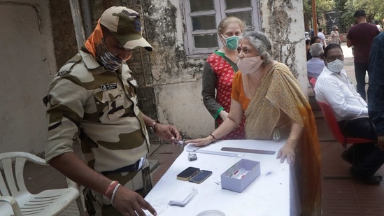 An elderly Indian woman enquires about Covid-19 vaccination in Mumbai, India, Wednesday, March 10, 2021. (AP) An elderly Indian woman enquires about Covid-19 vaccination in Mumbai, India, Wednesday, March 10, 2021. (AP)