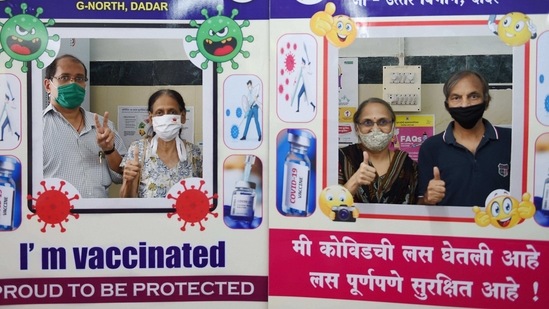 Senior citizens pose for photographs after being vaccinated against Covid-19, at BMC hospital, in Mumbai, on March 10. Meanwhile, Maharashtra recorded its highest single-day numbers in vaccination on March 11 after it inoculated 228,550 beneficiaries, taking the tally to 2,354,261.(Kunal Patil / PTI)