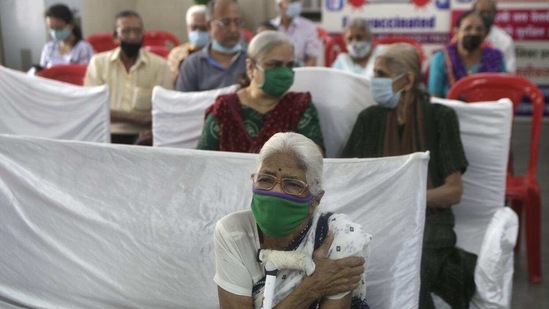 India’s Covid-19 vaccination drive began on January 16, 2021, and entered its second phase on March 1, 2021. In picture - Patients waiting in a holding area after receiving the vaccine in Mumbai.(AP) India’s Covid-19 vaccination drive began on January 16, 2021, and entered its second phase on March 1, 2021. In picture - Patients waiting in a holding area after receiving the vaccine in Mumbai.(AP)