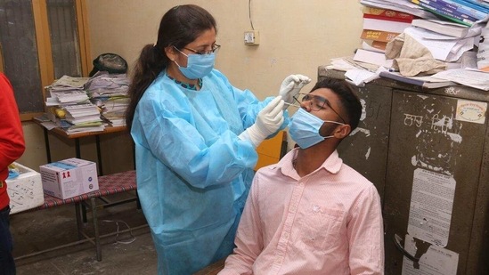 The state government conducted 36,412 Covid-19 tests and collected 19,644 samples on Friday. (HT Photo) The state government conducted 36,412 Covid-19 tests and collected 19,644 samples on Friday. (HT Photo)