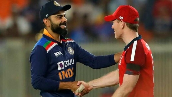 Indian captain Virat Kohli (L) shaking hands with his English counterpart Eoin Morgan (R) after England win the first T20I by 8 wickets (BCCI)