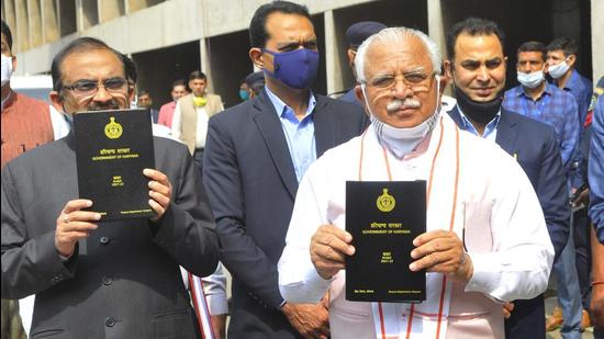 Haryana CM Manohar Lal Khattar arrives with budgetary proposals for the 2021-22 fiscal year, at the state assembly in Chandigarh on Friday. (KESHAV SINGH/HT) Haryana CM Manohar Lal Khattar arrives with budgetary proposals for the 2021-22 fiscal year, at the state assembly in Chandigarh on Friday. (KESHAV SINGH/HT)