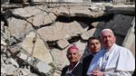 Pope Francis, accompanied by the Chaldean Catholic Archbishop of Mosul Najib Michaeel Moussa, looks on at a square near the ruins of the Syriac Catholic Church of the Immaculate Conception (al-Tahira-l-Kubra), in the old city of Iraq's northern Mosul, March 7, 2021 (AFP) Pope Francis, accompanied by the Chaldean Catholic Archbishop of Mosul Najib Michaeel Moussa, looks on at a square near the ruins of the Syriac Catholic Church of the Immaculate Conception (al-Tahira-l-Kubra), in the old city of Iraq's northern Mosul, March 7, 2021 (AFP)