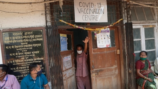 A health worker calls name of a person who is to receive COVID-19 vaccine in Mumbai, India, Wednesday, March 10, 2021. Pandemic-weary and sequestered mostly in their homes for a year, India’s elderly are now standing in long lines at vaccination sites, then rolling up their sleeves to get shots protecting them against the coronavirus. (AP Photo/Rajanish Kakade)(AP) A health worker calls name of a person who is to receive COVID-19 vaccine in Mumbai, India, Wednesday, March 10, 2021. Pandemic-weary and sequestered mostly in their homes for a year, India’s elderly are now standing in long lines at vaccination sites, then rolling up their sleeves to get shots protecting them against the coronavirus. (AP Photo/Rajanish Kakade)(AP)