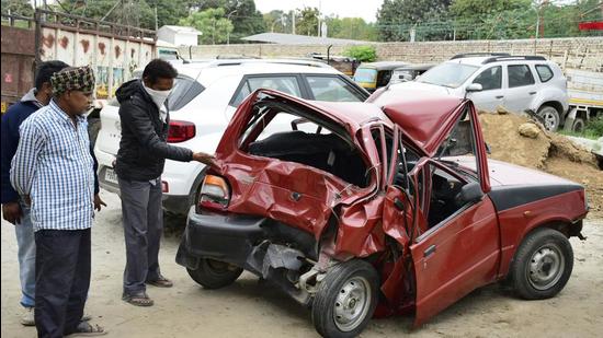The victims were pushing the car towards the fuelling station when the truck hit them. Police said the victims were crushed between the car and the truck. (Gurpreet Singh/HT)