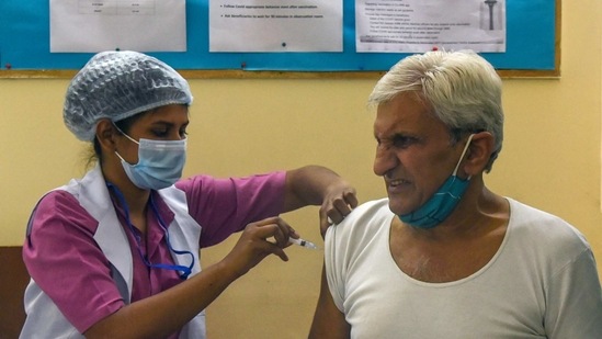 A health care staff inoculates senior citizens with a Covid-19 vaccine at a vaccination centre, in New Delhi on Saturday. (ANI Photo) A health care staff inoculates senior citizens with a Covid-19 vaccine at a vaccination centre, in New Delhi on Saturday. (ANI Photo)