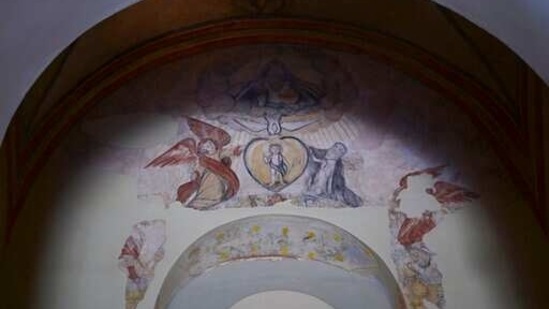 Details of a centuries-old mural are preserved inside San Jose Church, the second oldest Spanish church in the Americas, which will reopen following a massive reconstruction that took nearly two decades to complete, in San Juan, Puerto Rico, Tuesday, March 9, 2021. As workers probed with radar and laser technology and physically peeled away the church’s layers, they uncovered (AP)