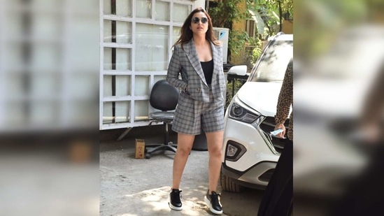 The Girl On The Train actor wore a basic black top which she teamed with a pair of grey and black checkered shorts and a matching blazer. (Varinder Chawla)