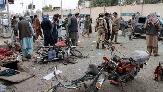 Security personnel inspect the site of a deadly roadside bomb explosion in Helmand province, southern Afghanistan. (AP) Security personnel inspect the site of a deadly roadside bomb explosion in Helmand province, southern Afghanistan. (AP)