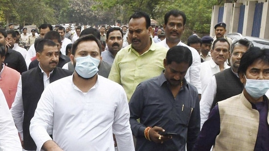 RJD leader Tejashwi Yadav staged a protest march with grand alliance legislators on liquor prohibition issue, during the Budget Session of Bihar Assembly, in Patna. (PTI Photo) RJD leader Tejashwi Yadav staged a protest march with grand alliance legislators on liquor prohibition issue, during the Budget Session of Bihar Assembly, in Patna. (PTI Photo)